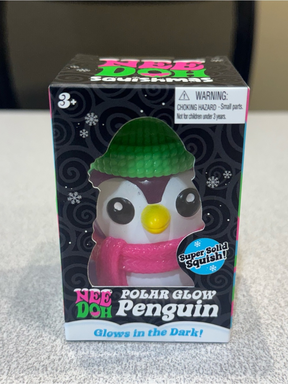 NEW NeeDoh Polar Glow Penguin Purple w/ Green Hat Super Solid Squishy Christmas